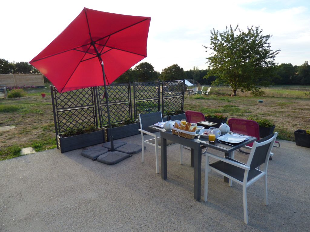 Petite escale à Saint-Révérend : terrasse et jardin